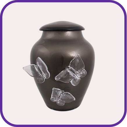 Urnen van glas met vlinder decoratie